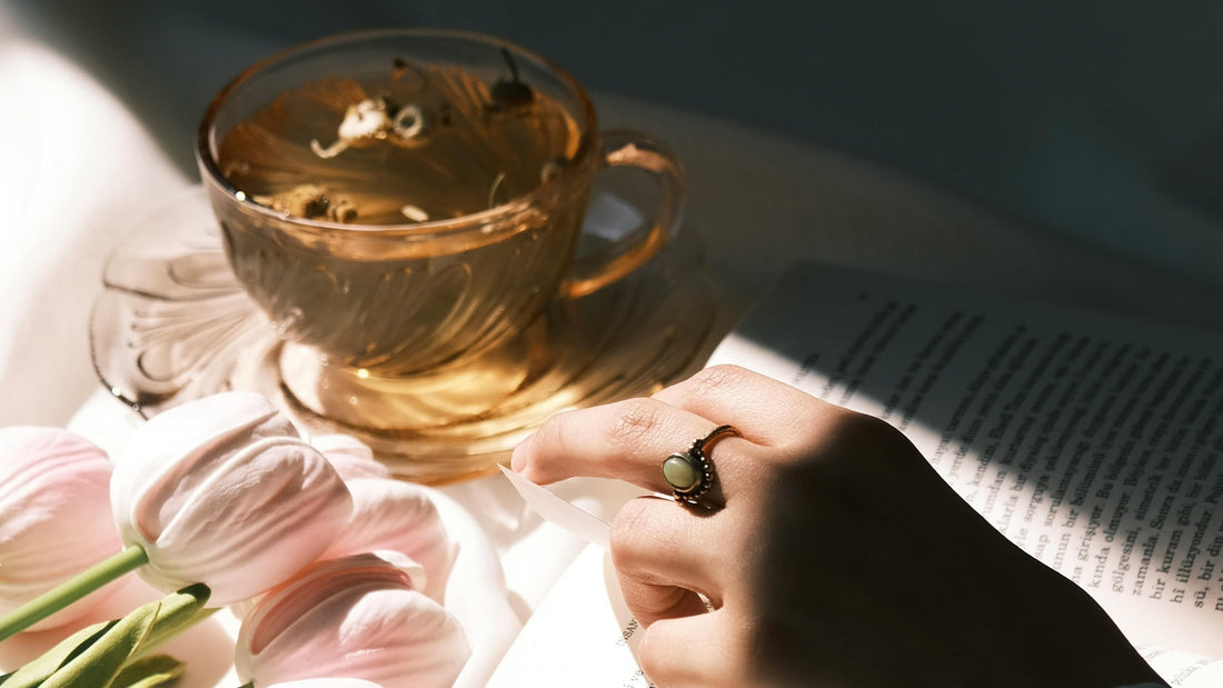 Tea and book for a Talk2Tessa guide on recovering from burnout in one gentle day.