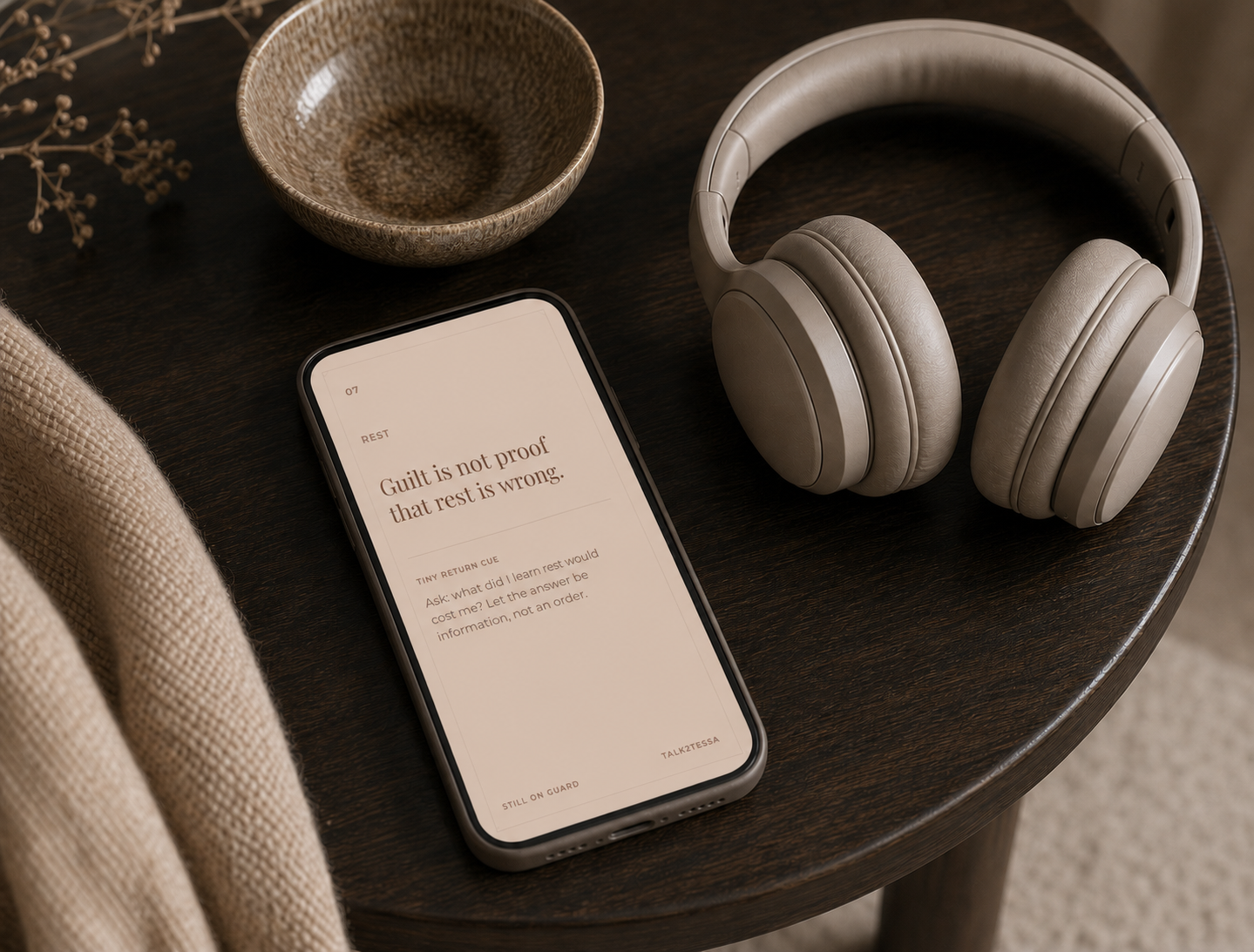 Still On Guard Return Kit card displayed on a phone beside headphones, showing gentle aftercare support for rest guilt after the 7-day reset.